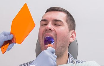 How to Treat a Partially Erupted Wisdom Tooth?